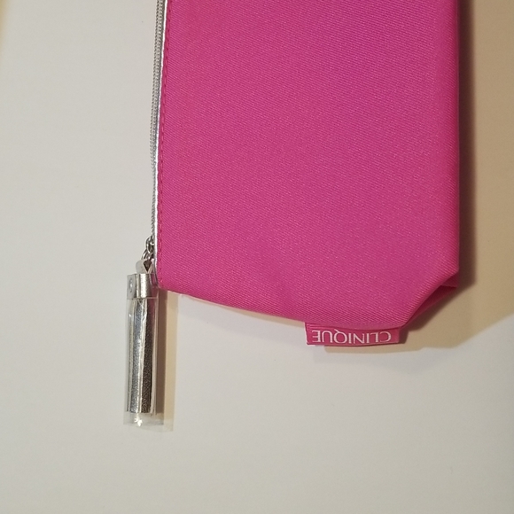 Clinique hot pink makeup carrying case with zipper closure & silver tassel NWOT - Picture 2 of 3
